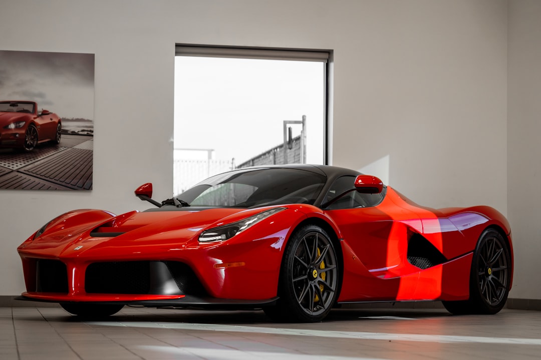 red-ferrari-458-italia-parked-in-front-of-white-wall-eqw1mpinev4